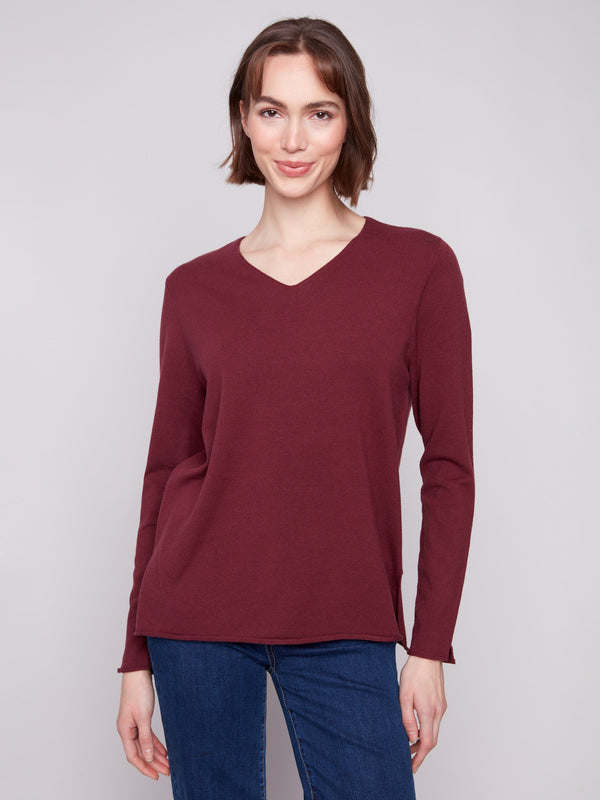 Cabernet sweater with a V neckline and plush texture, perfect for a cozy yet stylish look by Charlie B.