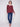Experience the elegance of long sleeves in this classic Cabernet sweater by Charlie B.