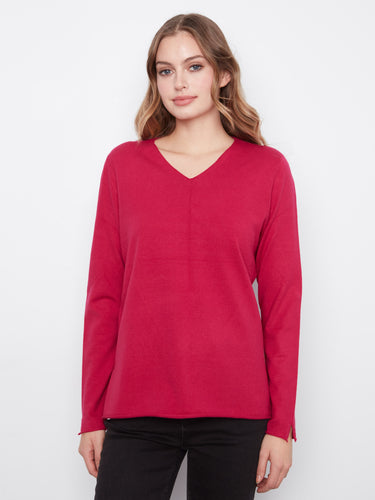 Soft knit top with a flattering V-neckline, perfect for versatile styling. By Charlie B.