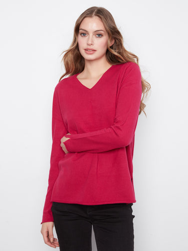 Crafted from soft knit fabric, offering both warmth and style effortlessly. By Charlie B.