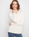 Elegant knit top with a V-neckline, perfect for layering. The soft texture adds comfort and style to any outfit by Charlie B.