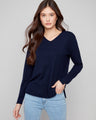 Navy sweater featuring a plush texture and V neckline, offering both comfort and style by Charlie B.