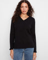 Black V-neck sweater featuring side slits for a modern touch by Charlie B.