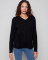 Elegant black sweater with a V neckline and plush texture, offering a timeless look by Charlie B.