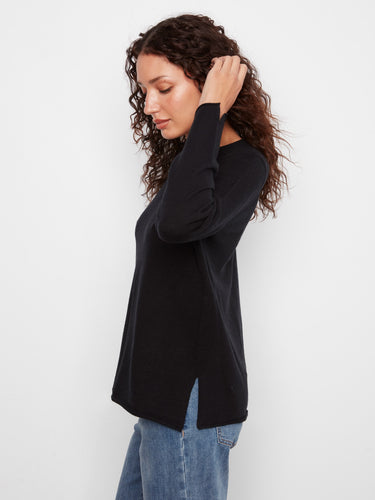 Soft knit black sweater with a relaxed fit, perfect for casual styling by Charlie B.