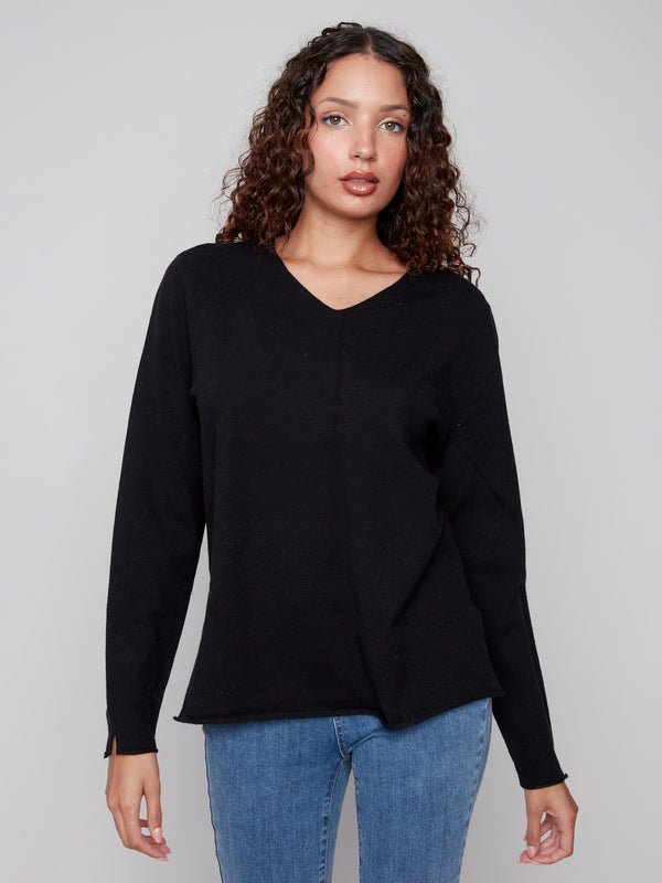 Classic black V-neck sweater crafted from plush material for ultimate comfort and style by Charlie B.