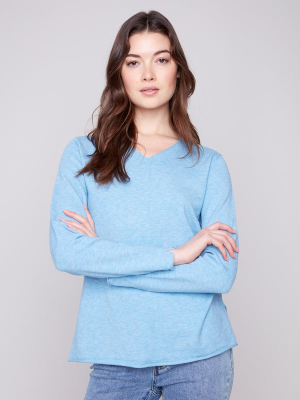 Plush texture adds a luxurious feel to this classic fit sweater, ideal for layering or wearing alone by Charlie B.