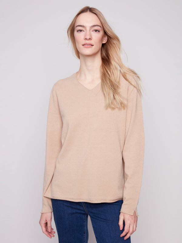 Sesame sweater with a plush texture and long sleeves, offering a cozy feel and timeless style by Charlie B.