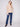 Elegant sesame V-neck sweater featuring side slits on sleeves and hem for added flair by Charlie B.