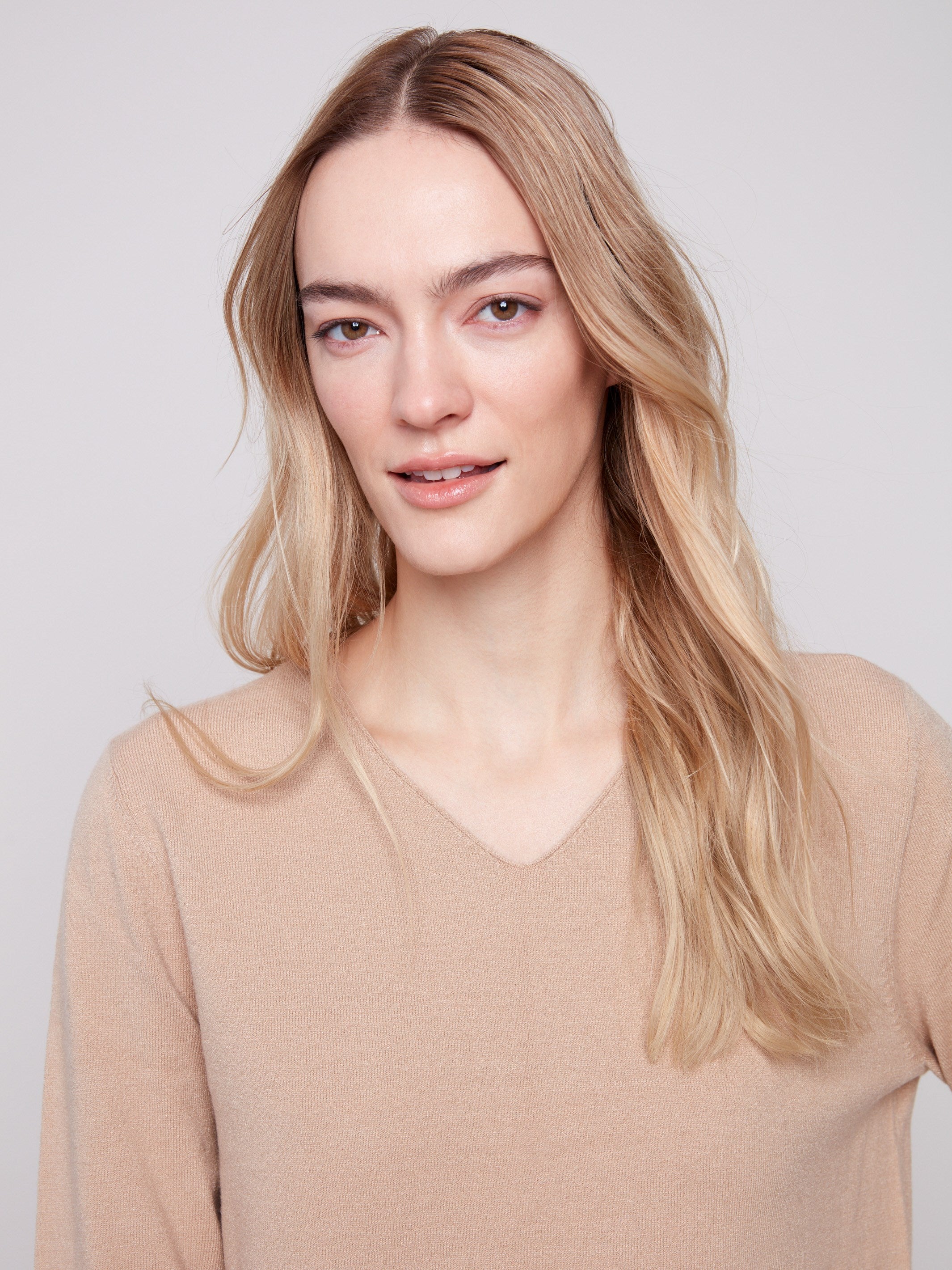 Classic sesame V-neck sweater crafted with plush texture, ensuring comfort and sophistication by Charlie B.