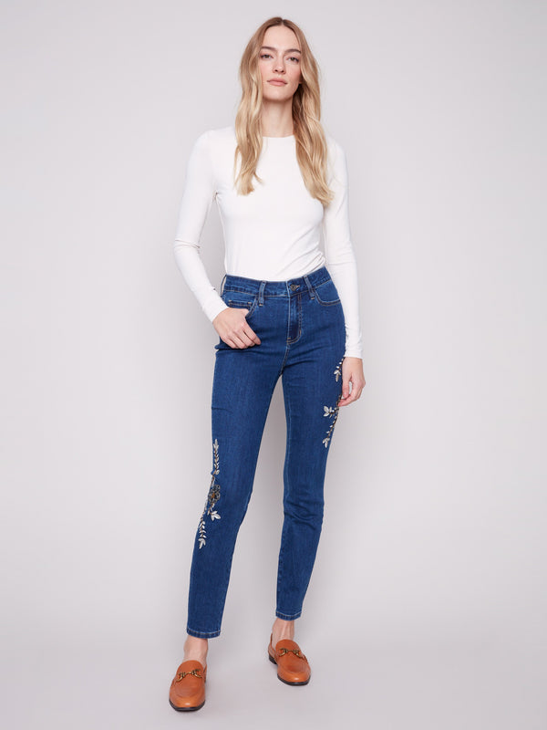 Indigo jeans with a skinny fit and floral embroidery, perfect for a chic look by Charlie B.