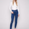 Indigo jeans with a skinny fit and floral embroidery, perfect for a chic look by Charlie B.