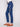 Long length indigo jeans with exquisite floral embroidery, combining style and comfort by Charlie B.