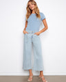 These jeans feature a wide leg design, offering a stylish and comfortable fit by Charlie B.