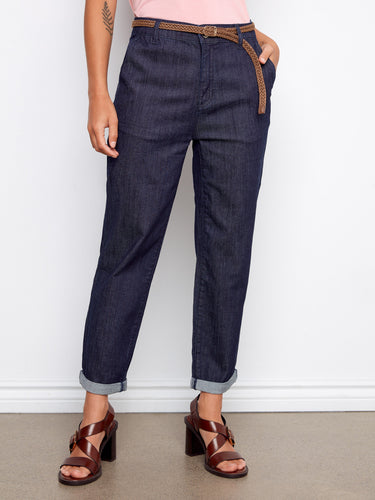 These stretch denim pants feature a regular rise and slash pockets, providing comfort and practicality by Charlie B.