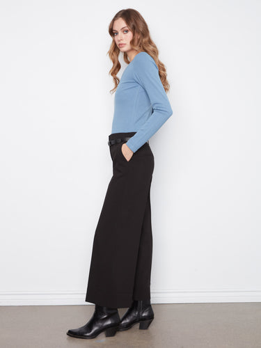 The belted design of these pants provides both style and functionality, ensuring a perfect fit every time by Charlie B.