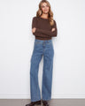 These jeans feature a stylish wide leg design, perfect for a chic and relaxed look. Crafted in stretch denim by Charlie B.