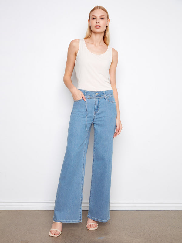 These jeans feature a wide leg silhouette, offering a trendy and comfortable fit, perfect for any casual outing. By Charlie B.