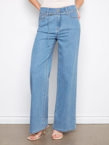 A belted design adds an extra touch of style to these versatile denim jeans. Perfect for accessorizing. By Charlie B.
