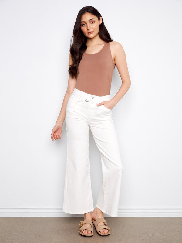 Featuring a classic five-pocket design, these white wide-leg pants are perfect for any occasion by Charlie B.