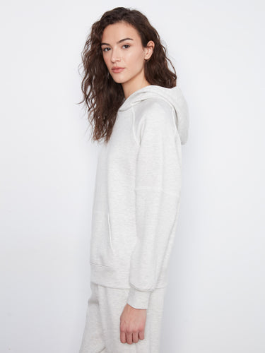 With its kangaroo pocket, this hoodie offers practicality and warmth for cooler days by Charlie B.