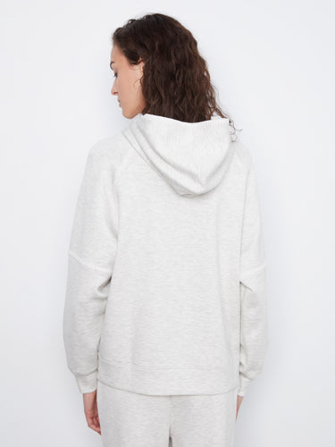 Adorned with blanket stitch details, this hoodie combines subtle elegance with everyday wearability by Charlie B.