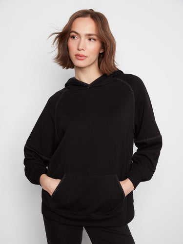 This hoodie features a relaxed fit, perfect for casual outings. The design ensures comfort and style in any setting by Charlie B.