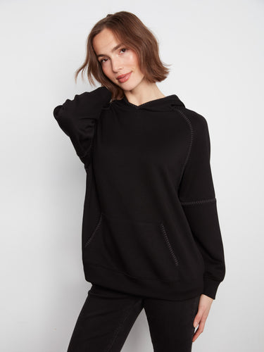 The hooded design of this hoodie adds a touch of versatility, making it ideal for layering and staying cozy by Charlie B.
