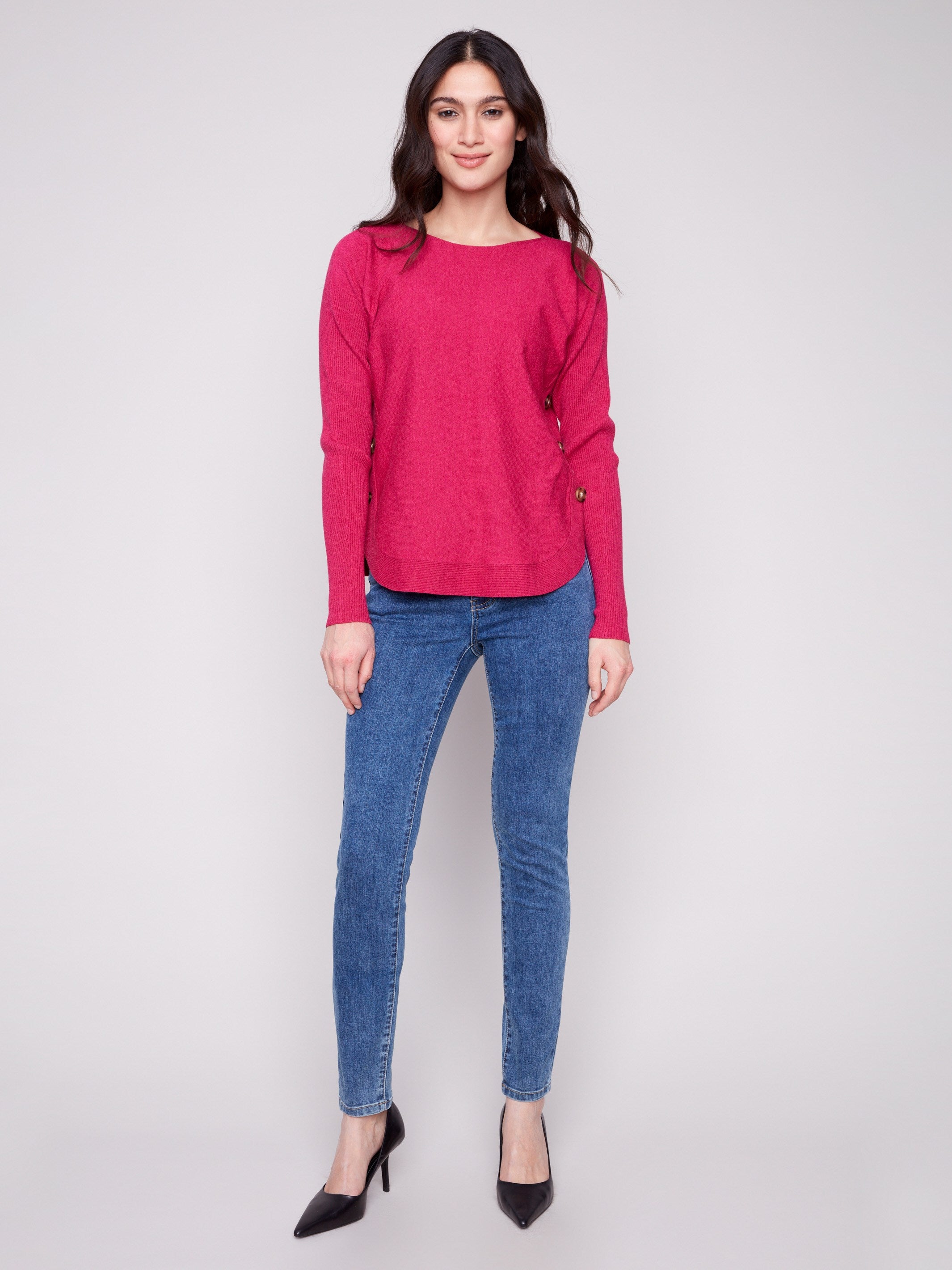 Long-sleeve sweater in heather hibiscus featuring rounded hem for added flair and comfort, perfect for any outing by Charlie B.