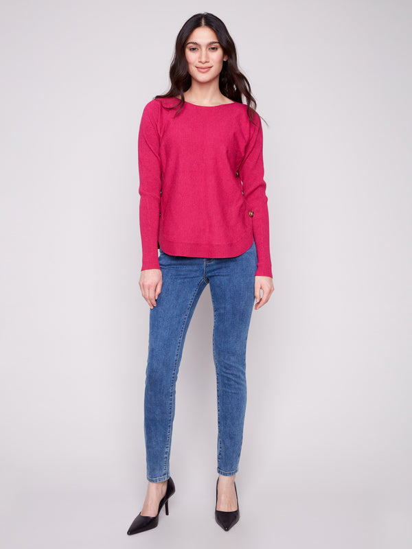 Long-sleeve sweater in heather hibiscus featuring rounded hem for added flair and comfort, perfect for any outing by Charlie B.