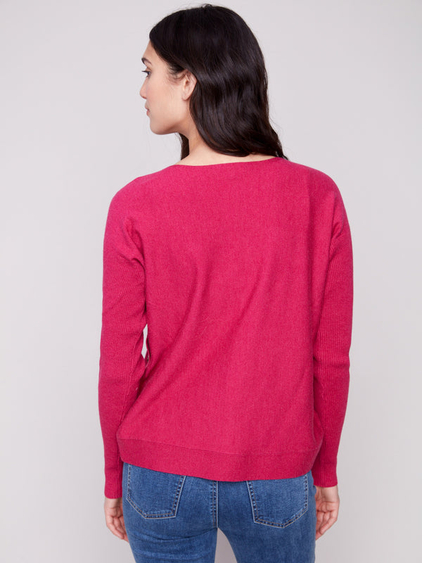 Elegant heather hibiscus sweater showcasing ribbed sleeves that add texture and warmth to your wardrobe by Charlie B.