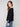 Black long-sleeve sweater featuring ribbed sleeves, providing comfort and style in equal measure by Charlie B.
