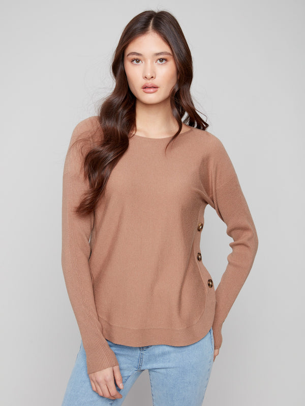 Truffle sweater with a chic boat neck design, ideal for pairing with jeans or skirts for a versatile look by Charlie B.