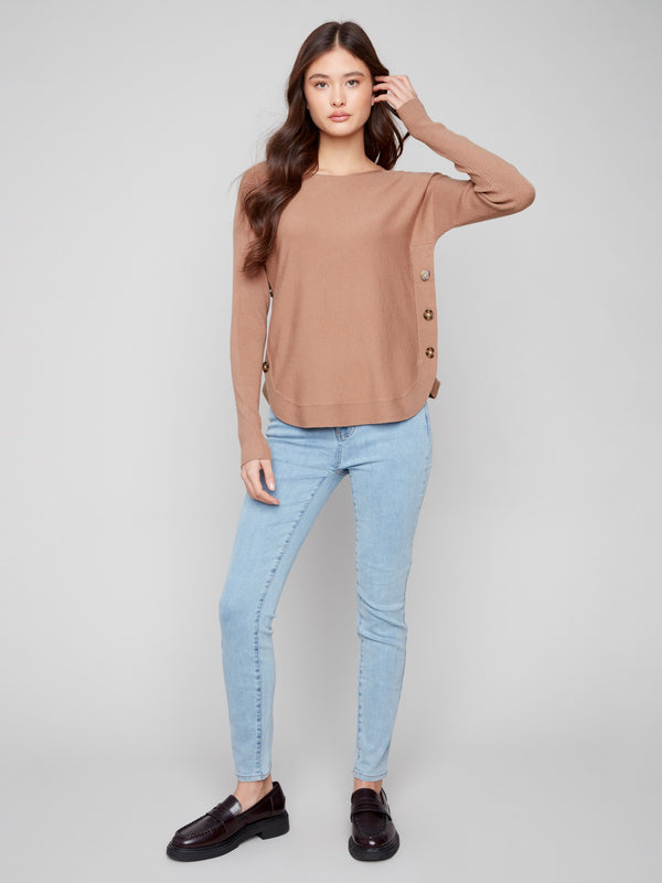 Elegant truffle sweater featuring eye-catching side button details, adding a stylish touch to any outfit by Charlie B.