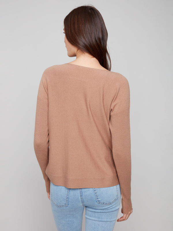 The ribbed sleeves on this truffle sweater provide added texture and style, perfect for cooler days by Charlie B.