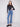 Crafted with attention to detail, these medium blue bootcut jeans feature a chic button front closure by Charlie B.