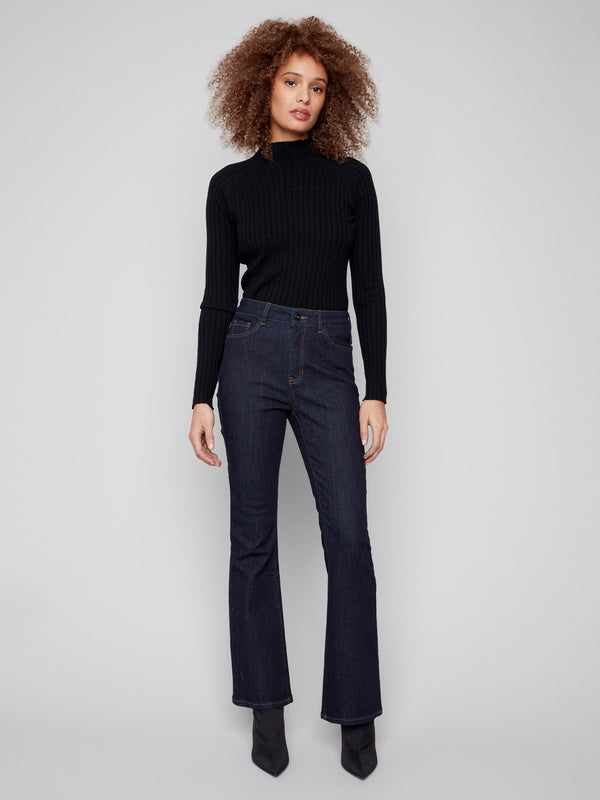 Elegant deep blue jeans featuring a long length, perfect for creating a sleek silhouette by Charlie B.