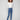 Medium blue bootcut jeans featuring a long length and stylish design by Charlie B.