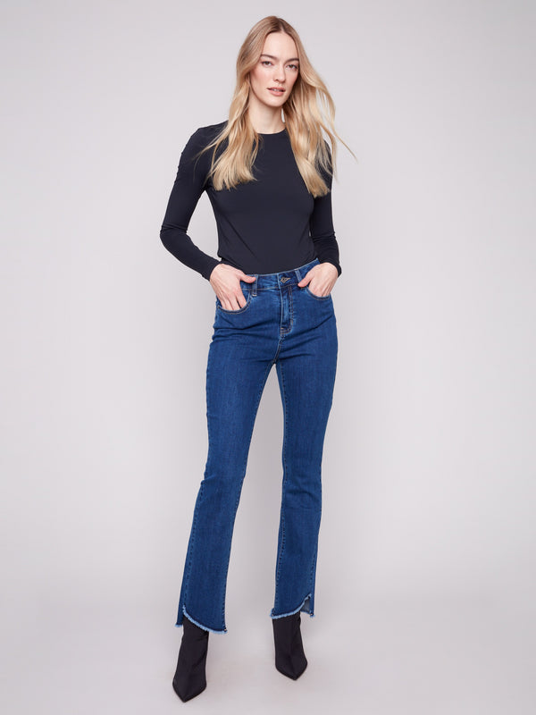 Indigo jeans featuring a stylish bootcut fit and long length, perfect for any occasion by Charlie B.