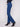 Regular rise indigo jeans with an elegant asymmetrical fringed hem detail by Charlie B.