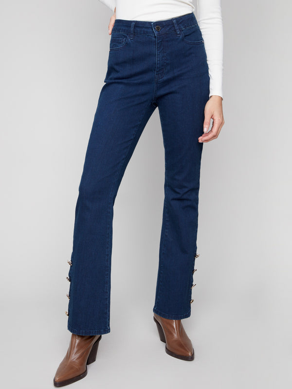 These jeans feature a regular rise waist, providing a flattering fit for any occasion by Charlie B.