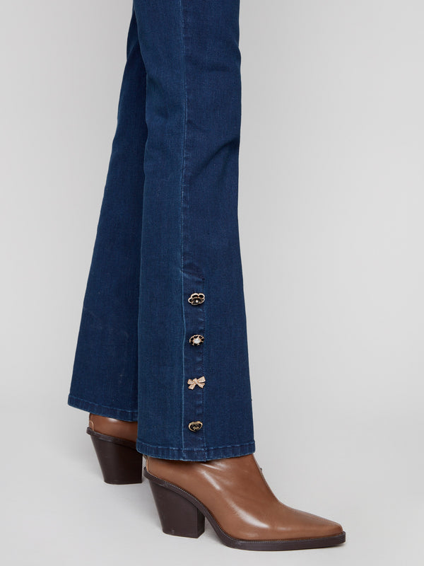 Adorned with snap gem buttons at the hem, adding a touch of elegance to your look by Charlie B.