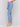 Stylish light blue jeans featuring side snap detail and stretch denim by Charlie B.