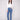 Medium blue denim pants featuring a bootcut fit and stretch fabric, offering comfort and style by Charlie B.