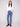 Medium blue denim pants featuring a bootcut fit and stretch fabric, offering comfort and style by Charlie B.