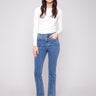 Medium blue denim pants featuring a bootcut fit and stretch fabric, offering comfort and style by Charlie B.