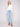 Light blue bootcut denim pants by Charlie B with a classic five-pocket design and regular rise.