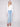 Light blue bootcut denim pants by Charlie B with a classic five-pocket design and regular rise.