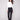 Black bootcut pants featuring a long length and stretch twill fabric for comfort and style by Charlie B.