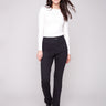 Black bootcut pants featuring a long length and stretch twill fabric for comfort and style by Charlie B.